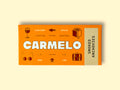 Carmelo smoked anchovies packaging on a wooden surface