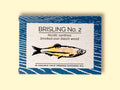 A tin of sprats in a rectangular box with a blue border and a painting of a yellow sprat on the front, against a dark wood background.