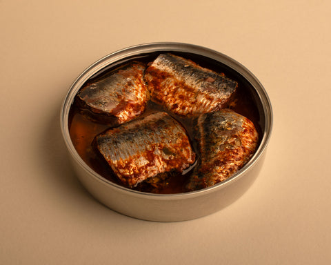 An open tin of Hevva Cornish sardines. The sustainably-caught sardines are dry-cured and simply preserved in rapeseed oil.