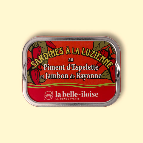 La Belle Iloise sardines with chilli and Bayonne ham Luzienne style, in a red illustrated tin.