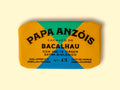 Cod in organic extra virgin olive oil, in a multicoloured wrapped tin with Portuguese words that read cod in organic olive oil.