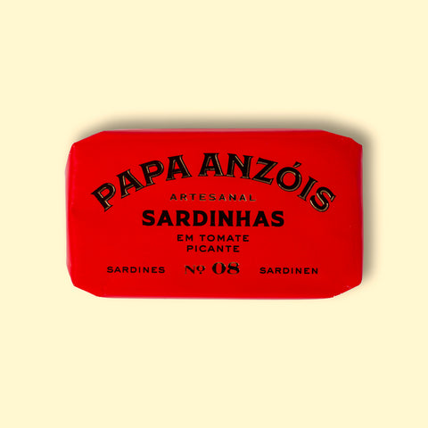 A tin of sardines in spicy tomato sauce in bright red packaging, with Papa Anzóis displayed at the top.