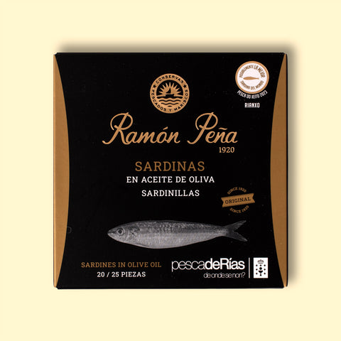 Xeito sardines from Ramon Pena, in a sleek black box, illustrated with a gold logo and writing, as well as a fish.