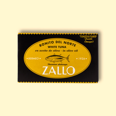 A rectangular tin of albacore tuna in black and yellow packaging with an image of a tuna fish on the front and Zallo written in white lettering