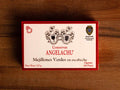 A tin of mussels in rectangular cardboard packaging. The packaging is white with an orange border. There are two coats of arms above Conservas Angelachu, which is written in orange lettering.