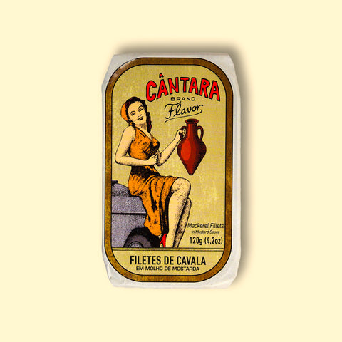 The tin's wrap depicts a woman in a yellow dress holding an amphora of olive oil with Cântara written in red lettering above. The tin is on a yellow table