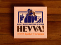 A square box with an image of a fisherman calling out over the Cornish coast. The packaging has a light background with purple, orange and gold lettering.