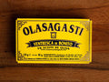 A tin of tuna belly in a rectangular yellow box with blue lettering and a gold border.