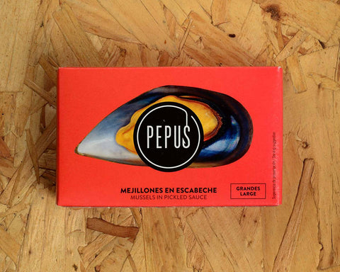 A tin of mussels in rectangular orange card packaging with an image of an orange mussel in its shell with the Pepus circular logo overlaid