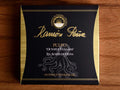 Tinned octopus in black and gold packaging. Ramón Peña is written in raised gold lettering above a silver grey image of an octopus on the front of the packaging.