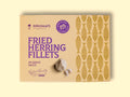 A  tin of herring fillets in cream-coloured packaging with purple lettering by a picture of a garlic bulb and two garlic cloves.