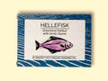 Greenland halibut in a rich, organic cold-pressed rapeseed oil, gently seasoned with Arctic Thyme. The halibut is flaky, fall-apart and tender, and comes in an illustrated purple fish box.