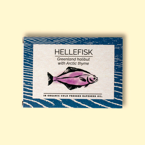 Greenland halibut in a rich, organic cold-pressed rapeseed oil, gently seasoned with Arctic Thyme. The halibut is flaky, fall-apart and tender, and comes in an illustrated purple fish box.