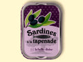 ardines with black olive tapenade, in a purple tin illustrated with a fish and olives.