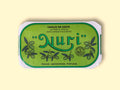 A tin of mackerel fillets in a green paper wrap with Nuri written in green lettering above some small olive branches.