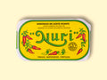 A tin of spicy sardines in a yellow wrap with a white and green border. Nuri is written in green lettering above some red chilli peppers.
