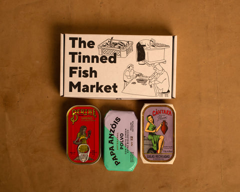 A selection box containing Berthe olive oil sardines, Papa Anzois octopus and Cantara stuffed squid.