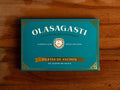 Olasagasti anchovy fillets blue packaging on a wooden surface