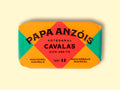 A tin of mackerel in olive oil from Papa Anzois, inside a brightly coloured orange, red and green packaging. 