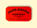 A tin of sardines with chilli and olive oil in bright red packaging, featuring the Papa Anzois brand name at the top. 