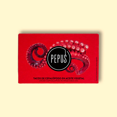 Diced squid in vegetable oil from the brand Pepus, in a red illustrated box feauturing a tentacle.