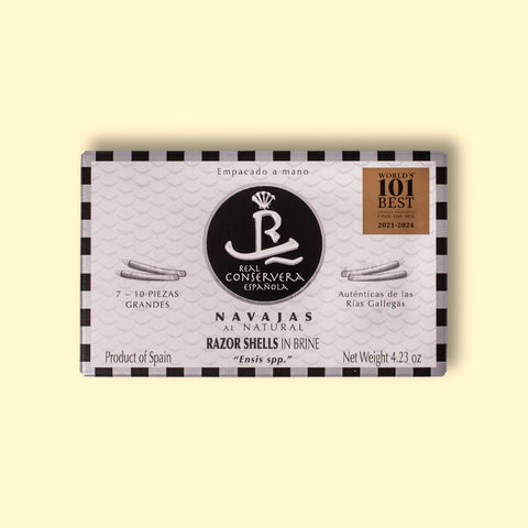 Razor clams in black and white card packaging, with a silver and black border and illustrations of razor clams either side of the Real Conservera logo.
