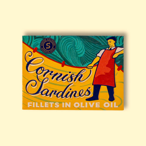Sound Seafood Cornish Sardines in a colourful, illustrated box featuring a fishmonger.