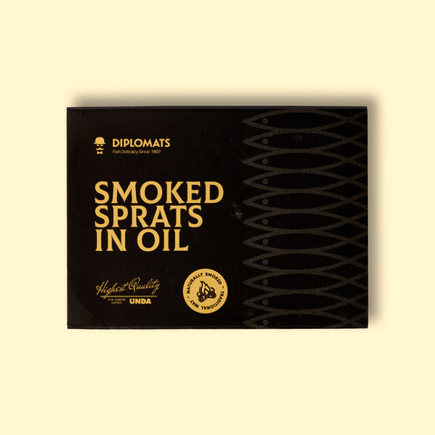 A black rectangular tin with smoked sprats in oil written on it in yellow lettering. A pale grey geometric design created out of fish is on the right of the tin. The tin is against a pale yellow background. 