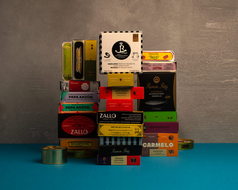 A modern selection with spanish tinned fish including sardines, tuna and mussels
